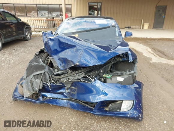 2017 Tesla Model S 100D with VIN 5YJSA1E27HF220982, listed as a IAAI auction lot 41731047 with Not Provided miles and . Bid and sale history available at DreamBid. Image 12.