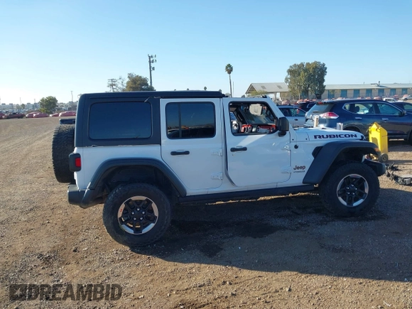 2019 Jeep Wrangler Unlimited Rubicon with VIN 1C4HJXFN7KW505383, listed as a IAAI auction lot 41220907 with 53,578 mi miles and . Bid and sale history available at DreamBid. Image 13.