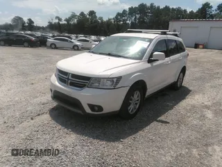 2017 Dodge Journey SXT z VIN 3C4PDCBG3HT537331, wystawiony jako IAAI lot #42694213 z przebiegiem 193 609 mil mil oraz . Historia ofert i sprzedaży dostępna na DreamBid. Obrazek 17.