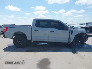 2023 Ford F-150 XL with VIN 1FTFW1E84PFA48461, listed as a IAAI auction lot 42096361 with 52,354 mi miles and . Bid and sale history available at DreamBid. Image 14.