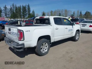 2017 GMC Canyon 4WD SLE with VIN 1GTG6CEN0H1155690, listed as a IAAI auction lot 41956326 with 56,841 mi miles. Bid and sale history available at carsss.com. Image 4.