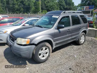 2003 Ford Escape XLT Popular 2 z VIN 1FMYU93163KC65008, wystawiony jako Copart lot #66263635 z przebiegiem 141 536 mil mil oraz Szkoda całkowita • Salvage title. Historia ofert i sprzedaży dostępna na DreamBid. Obrazek 1.