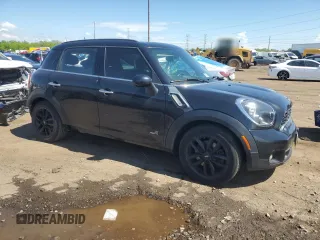 2013 MINI Countryman S ALL4 z VIN WMWZC5C54DWP34353, wystawiony jako Copart lot #57059295 z przebiegiem 154 012 mil mil oraz Szkoda całkowita • Salvage title. Historia ofert i sprzedaży dostępna na DreamBid. Obrazek 4.