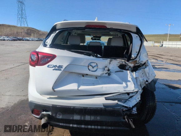 2016 Mazda CX-5 Grand Touring with VIN JM3KE4DY8G0671256, listed as a Copart auction lot 52920975 with 87,822 mi miles and Non Repairable. Bid and sale history available at carsss.com. Image 6.