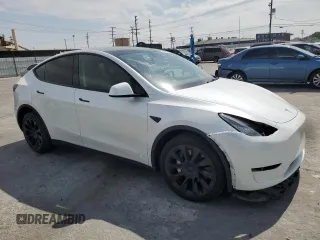 2023 Tesla Model Y Long Range z VIN 7SAYGDEE8PA030286, wystawiony jako Copart lot #50945465 z przebiegiem 43 676 mil mil oraz Szkoda całkowita • Salvage title. Historia ofert i sprzedaży dostępna na DreamBid. Obrazek 4.