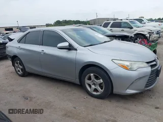 2015 Toyota Camry XLE with VIN 4T4BF1FKXFR472201, listed as a IAAI auction lot 41883944 with 143,296 mi miles and . Bid and sale history available at DreamBid. Image 14.