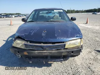 1999 Mitsubishi Mirage DE with VIN JA3AY26AXXU050527, listed as a Copart auction lot 74435914 with 101,224 mi miles and Salvage title. Bid and sale history available at DreamBid. Image 5.