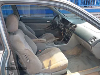 1995 Honda Accord EX with VIN 1HGCD7252SA016119, listed as a IAAI auction lot 41594325 with 231,799 mi miles and . Bid and sale history available at carsss.com. Image 5.