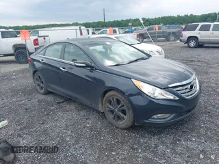 2012 Hyundai Sonata SE z VIN 5NPEC4AC1CH375481, wystawiony jako IAAI lot #42448689 z przebiegiem 138 884 mil mil oraz . Historia ofert i sprzedaży dostępna na DreamBid. Obrazek 1.