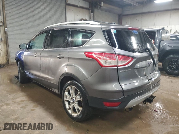 2014 Ford Escape Titanium with VIN 1FMCU9J96EUB44263, listed as a Copart auction lot 50001895 with 242,807 mi miles and Salvage Title. Bid and sale history available at carsss.com. Image 2.