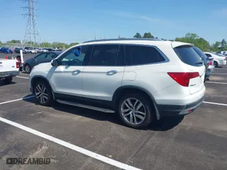 2017 Honda Pilot Touring with VIN 5FNYF5H96HB036547, listed as a IAAI auction lot 42058142 with 161,828 mi miles. Bid and sale history available at carsss.com. Image 14.