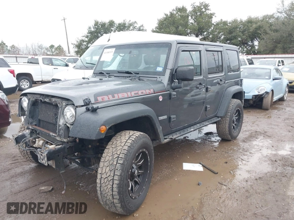 2018 Jeep Wrangler Unlimited Rubicon Recon with VIN 1C4BJWFG4JL827920, listed as a IAAI auction lot 41368319 with 110,835 mi miles and . Bid and sale history available at DreamBid. Image 2.