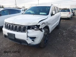 2018 Jeep Grand Cherokee Laredo E with VIN 1C4RJFAG6JC406061, listed as a IAAI auction lot 42046977 with 90,339 mi miles and . Bid and sale history available at DreamBid. Image 6.