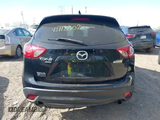 2014 Mazda CX-5 Touring z VIN JM3KE4CY4E0328880, wystawiony jako IAAI lot #42112302 z przebiegiem 185 228 mil mil oraz . Historia ofert i sprzedaży dostępna na DreamBid. Obrazek 17.