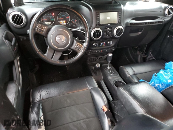 2012 Jeep Wrangler Unlimited Call of Duty MW3 with VIN 1C4BJWFG0CL218214, listed as a Copart auction lot 58432635 with 109,128 mi miles and Clean title. Bid and sale history available at DreamBid. Image 8.