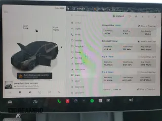 2023 Tesla Model Y Long Range z VIN 7SAYGDEE0PF869710, wystawiony jako Copart lot #52885365 z przebiegiem 13 919 mil mil oraz Szkoda całkowita • Salvage title. Historia ofert i sprzedaży dostępna na DreamBid. Obrazek 9.