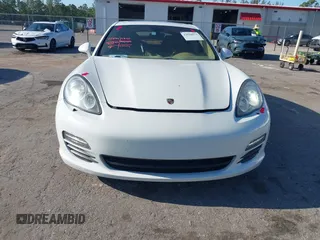 2013 Porsche Panamera with VIN WP0AA2A7XDL014047, listed as a IAAI auction lot 42010031 with 118,681 mi miles and . Bid and sale history available at DreamBid. Image 6.