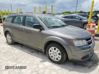 2013 Dodge Journey SE z VIN 3C4PDCAB0DT728950, wystawiony jako Copart lot #57525305 z przebiegiem 181 414 mil mil oraz Czysty tytuł • Clean title. Historia ofert i sprzedaży dostępna na DreamBid. Obrazek 4.