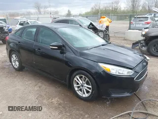 2016 Ford Focus SE with VIN 1FADP3F26GL280805, listed as a IAAI auction lot 42031492 with 146,986 mi miles. Bid and sale history available at carsss.com. Image 1.