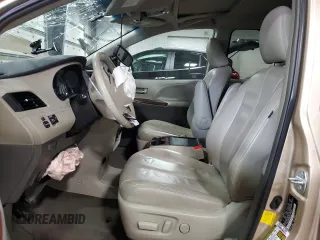 2013 Toyota Sienna XLE z VIN 5TDDK3DCXDS054751, wystawiony jako Copart lot #54004715 z przebiegiem 72 627 mil mil oraz Szkoda całkowita • Salvage title. Historia ofert i sprzedaży dostępna na DreamBid. Obrazek 7.