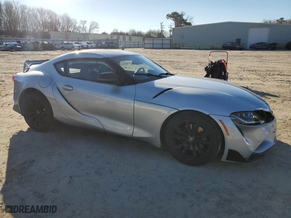 2022 Toyota GR Supra 2.0 with VIN WZ1DB2C08NW050265, listed as a Copart auction lot 88882465 with 14,576 mi miles and Salvage Title. Bid and sale history available at carsss.com. Image 4.