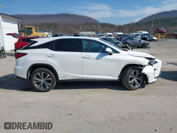 2016 Lexus RX 450h with VIN 2T2BGMCAXGC004844, listed as a IAAI auction lot 41791066 with 100,604 mi miles and . Bid and sale history available at DreamBid. Image 13.