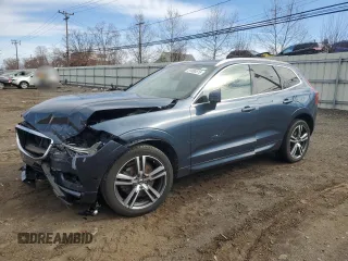 2018 Volvo XC60 Momentum с VIN YV4A22RKXJ1043803, выставлен на аукционе Copart как лот 51000515 с пробегом Не указан миль и Списание • Salvage title. История ставок и продаж доступна на DreamBid. Изображение 1.