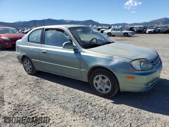 2003 Hyundai Accent GL with VIN KMHCG35C83U257641, listed as a Copart auction lot 73421464 with 143,814 mi miles and Clean Title. Bid and sale history available at carsss.com. Image 4.