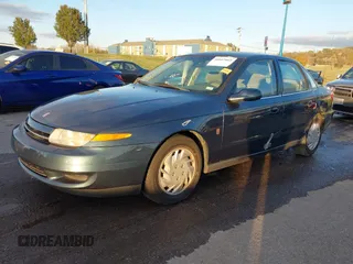 2002 Saturn LS z VIN 1G8JU54F22Y522311, wystawiony jako IAAI lot #40807065 z przebiegiem 209 242 mil mil oraz . Historia ofert i sprzedaży dostępna na DreamBid. Obrazek 2.