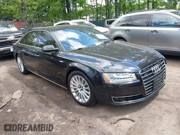 2015 Audi A8 3.0T z VIN WAU3GAFD4FN039482, wystawiony jako IAAI lot #42330349 z przebiegiem 132 718 mil mil oraz . Historia ofert i sprzedaży dostępna na DreamBid. Obrazek 1.