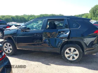 2019 Toyota RAV4 LE with VIN JTMH1RFV9KD515999, listed as a IAAI auction lot 42635692 with 87,345 mi miles and . Bid and sale history available at DreamBid. Image 14.