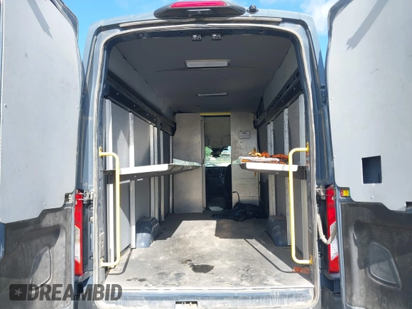 2021 Ford Transit Cargo with VIN 1FTBR3X89MKA54791, listed as a IAAI auction lot 42515449 with 57,847 mi miles and . Bid and sale history available at DreamBid. Image 8.