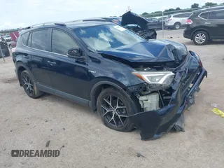2018 Toyota RAV4 Hybrid SE with VIN JTMJJREV6JD216018, listed as a IAAI auction lot 42616351 with 132,467 mi miles and . Bid and sale history available at DreamBid. Image 1.