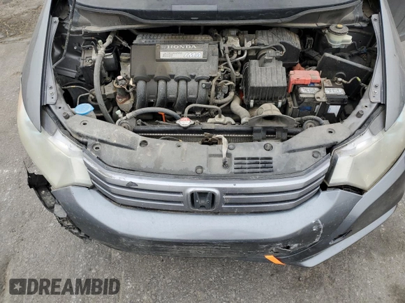 2010 Honda Insight EX with VIN JHMZE2H79AS017647, listed as a Copart auction lot 53311325 with 94,999 mi miles and Salvage Title. Bid and sale history available at DreamBid. Image 13.