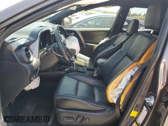 2016 Toyota RAV4 SE with VIN JTMNFREV2GJ072643, listed as a Copart auction lot 63879695 with 104,118 mi miles and Salvage title. Bid and sale history available at DreamBid. Image 7.