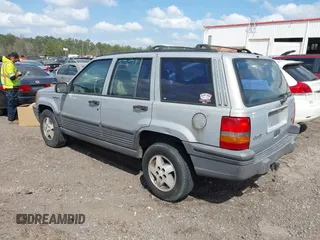 1994 Jeep Grand Cherokee Laredo with VIN 1J4GZ58Y0RC200247, listed as a IAAI auction lot 41781078 with 217,698 mi miles. Bid and sale history available at carsss.com. Image 3.