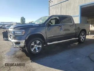 2020 Ram 1500 Laramie with VIN 1C6SRFJM1LN382122, listed as a Copart auction lot 73381894 with 58,848 mi miles and Salvage title. Bid and sale history available at DreamBid. Image 1.
