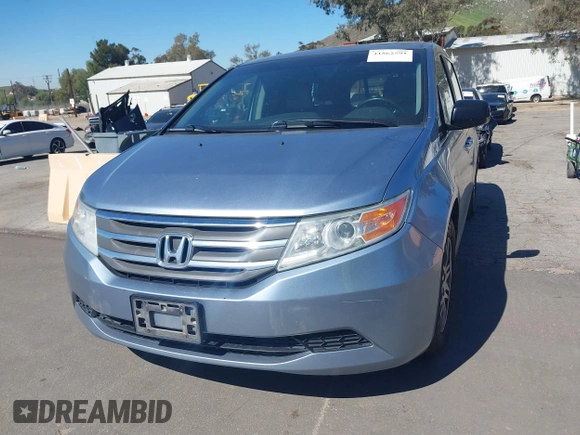 2012 Honda Odyssey EX-L with VIN 5FNRL5H69CB003067, listed as a IAAI auction lot 41862591 with 163,158 mi miles and . Bid and sale history available at carsss.com. Image 6.
