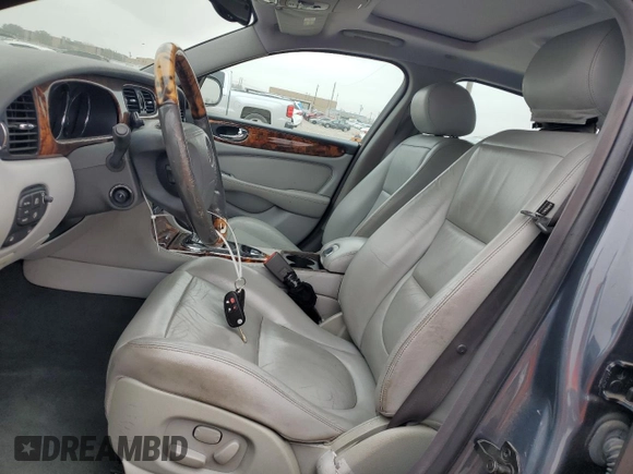 2004 Jaguar XJ with VIN SAJWA71C04SG22878, listed as a Copart auction lot 44383205 with 127,515 mi miles and Clean Title. Bid and sale history available at carsss.com. Image 7.