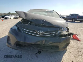 2013 Toyota Corolla L with VIN 5YFBU4EE1DP201779, listed as a Copart auction lot 77087414 with 206,263 mi miles and Salvage Title. Bid and sale history available at carsss.com. Image 5.