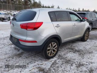2015 Kia Sportage LX with VIN KNDPBCAC2F7792610, listed as a IAAI auction lot 41249421 with 190,680 mi miles and . Bid and sale history available at DreamBid. Image 4.