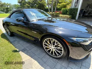 2022 Mercedes-Benz SL 63 AMG z VIN W1KVK8BBXNF003XXX, wystawiony jako Copart lot #48634105 z przebiegiem 10 209 mil mil oraz Czysty tytuł • Clean title. Historia ofert i sprzedaży dostępna na DreamBid. Obrazek 1.