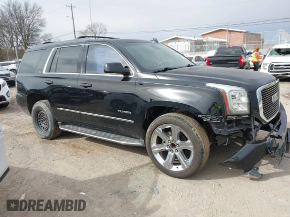 2016 GMC Yukon SLT with VIN 1GKS1BKC3GR272738, listed as a IAAI auction lot 41712439 with 169,726 mi miles. Bid and sale history available at carsss.com. Image 13.