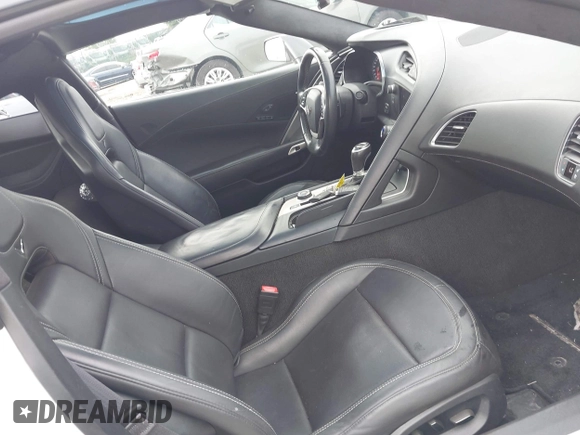 2015 Chevrolet Corvette Z51 3LT z VIN 1G1YM2D72F5119618, wystawiony jako IAAI lot #42744702 z przebiegiem Nie podano mil oraz . Historia ofert i sprzedaży dostępna na DreamBid. Obrazek 5.