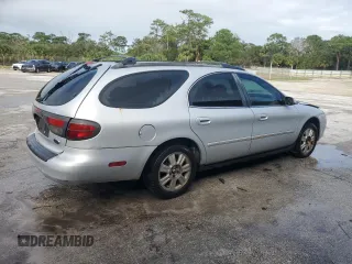2003 Ford Taurus z VIN 1FAHP59U73A217826, wystawiony jako Copart lot #80059964 z przebiegiem 315 560 mil mil oraz Szkody całkowita. Historia ofert i sprzedaży dostępna na DreamBid. Obrazek 3.