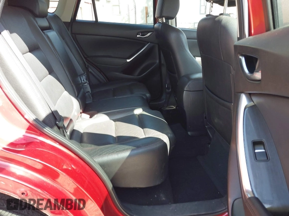 2016 Mazda CX-5 Grand Touring with VIN JM3KE2DY3G0686588, listed as a IAAI auction lot 41697312 with 65,090 mi miles. Bid and sale history available at carsss.com. Image 8.
