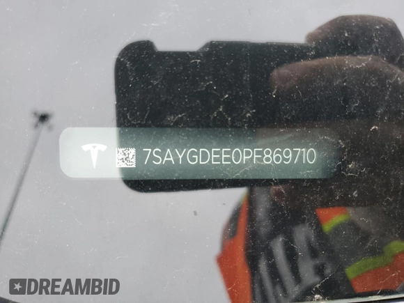 2023 Tesla Model Y Long Range z VIN 7SAYGDEE0PF869710, wystawiony jako Copart lot #52885365 z przebiegiem 13 919 mil mil oraz Szkoda całkowita • Salvage title. Historia ofert i sprzedaży dostępna na DreamBid. Obrazek 12.
