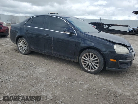 2009 Volkswagen Jetta SE with VIN 3VWRM71K49M172348, listed as a Copart auction lot 60603895 with 129,515 mi miles and Salvage title. Bid and sale history available at DreamBid. Image 4.