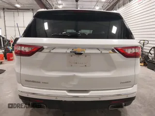 2021 Chevrolet Traverse Premier with VIN 1GNEVKKW7MJ218772, listed as a IAAI auction lot 42306743 with 106,898 mi miles and . Bid and sale history available at DreamBid. Image 16.