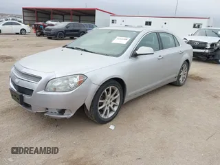 2012 Chevrolet Malibu LTZ with VIN 1G1ZG5E79CF264351, listed as a IAAI auction lot 41465508 with 213,854 mi miles and . Bid and sale history available at DreamBid. Image 2.